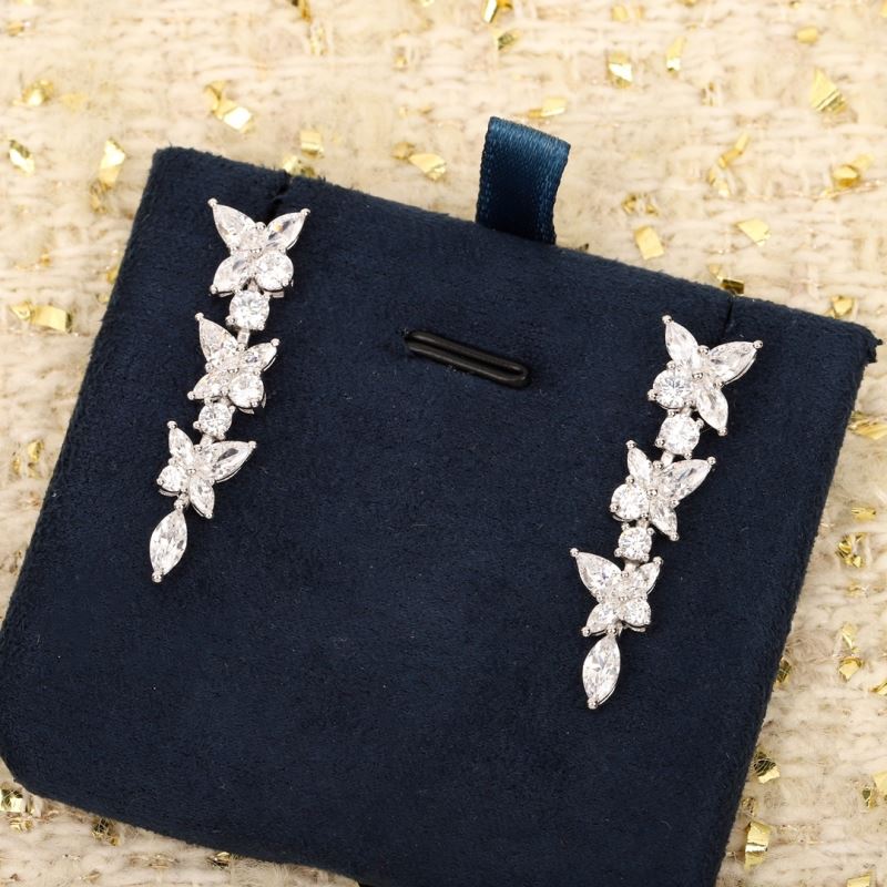T*f*ny earrings